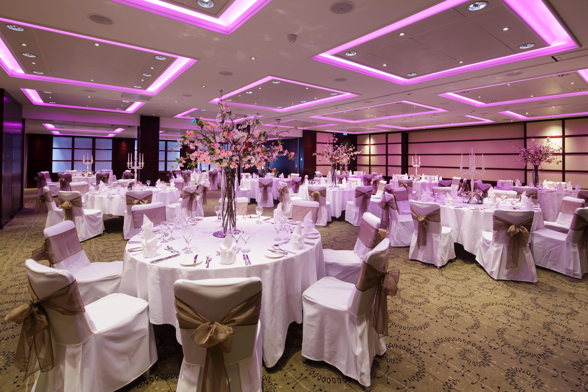 Wedding tables set up in the Golden Apple Suite